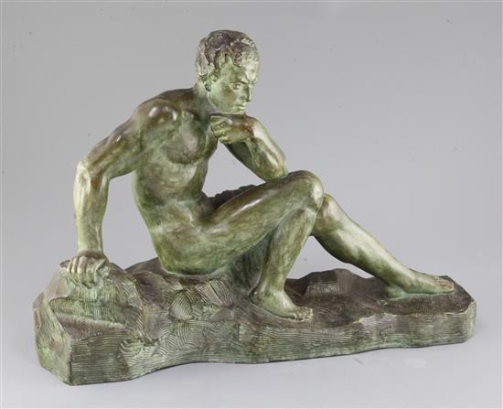 A. Ouline. An Art Deco bronzed terracotta figure of a seated man, width 19in. height 14in.